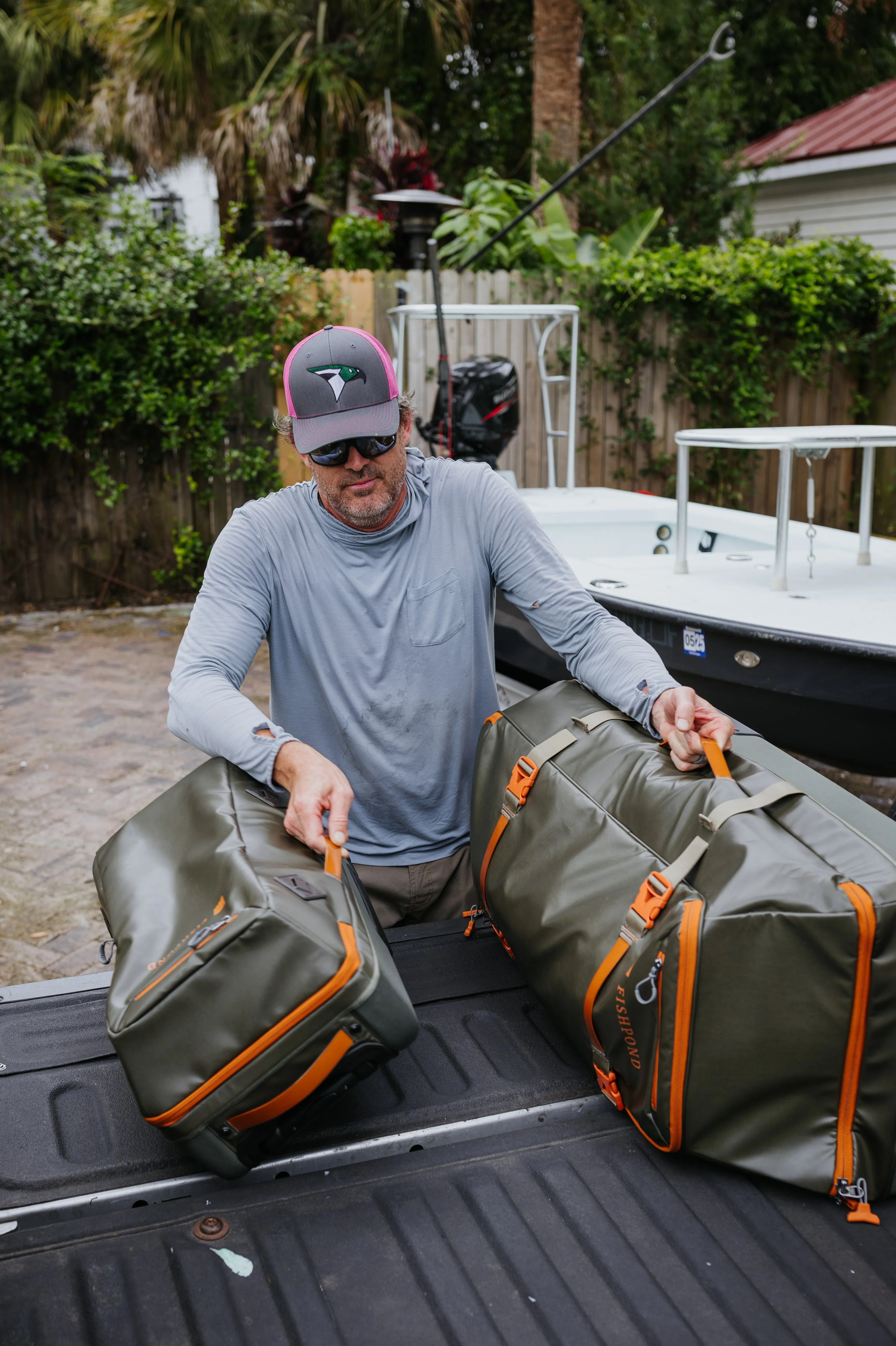 Fishpond Stormshadow Rolling Carry-On - Green